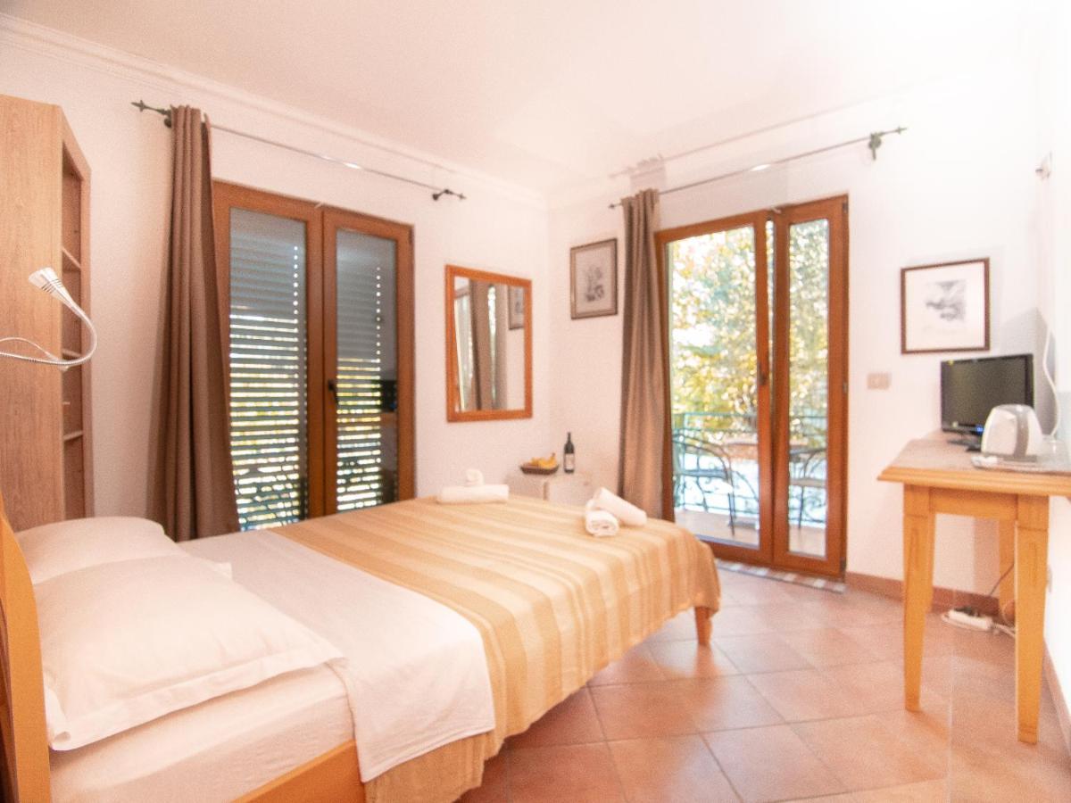 Apartments And Rooms Levantin Inn Sveti Stefan Esterno foto